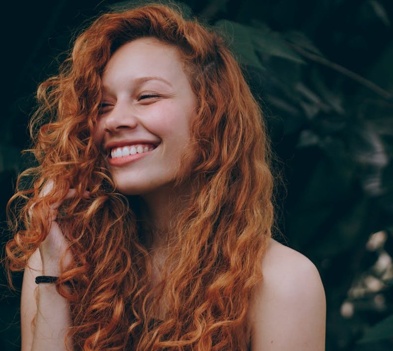 Smiling Woman With Red Hair